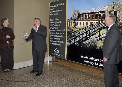 Keith greets the crowd during the opening of South Village Crossing